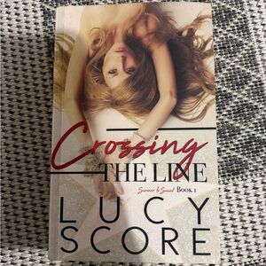3/20$ Crossing the Line by Lucy Score Book